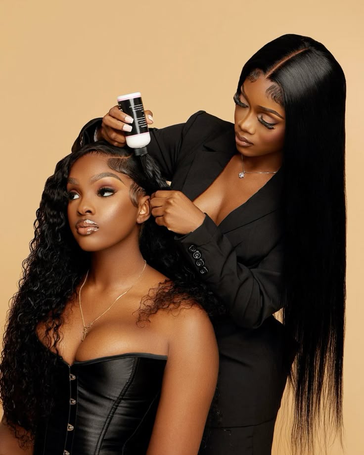 A styling session featuring voluminous curls and sleek straight hair